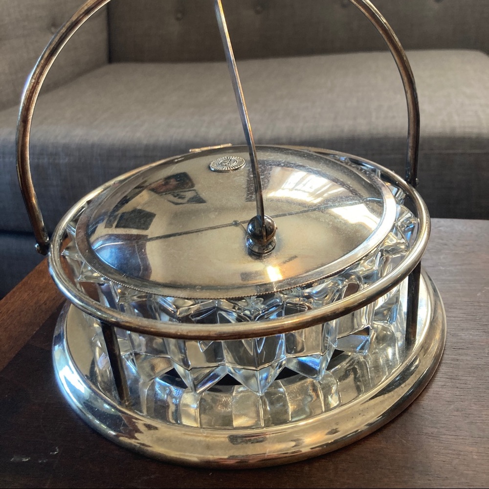 This unique serving piece is a cut glass (crystal?)